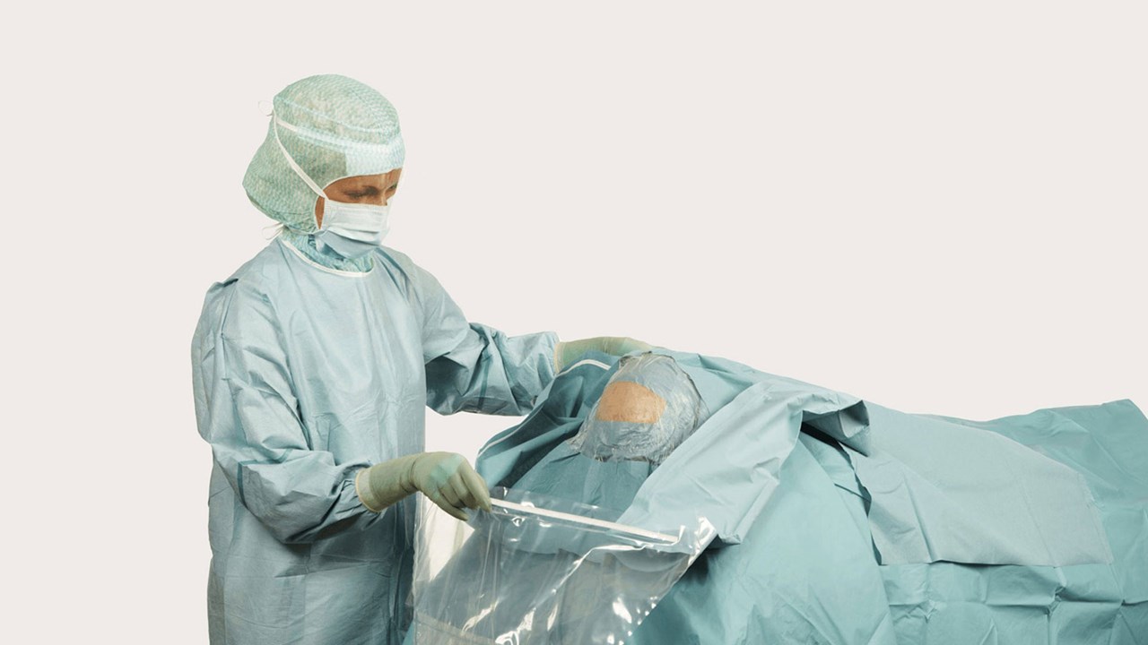 clinician using a BARRIER Neurosurgery drape