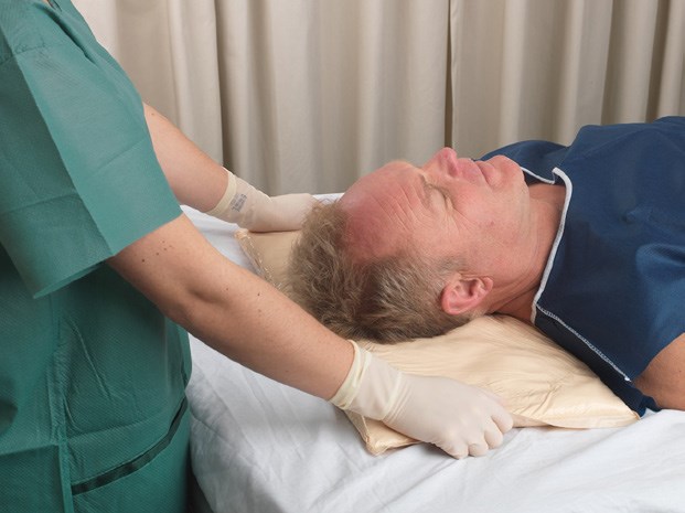Place Z-Flo under the head and align it with the top of the shoulders